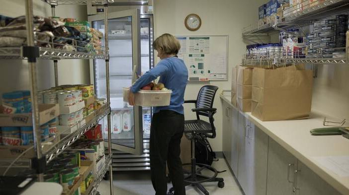 Woman at Dartmouth Cancer Food Pantry
